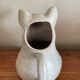 Pig-shaped sandstone pitcher