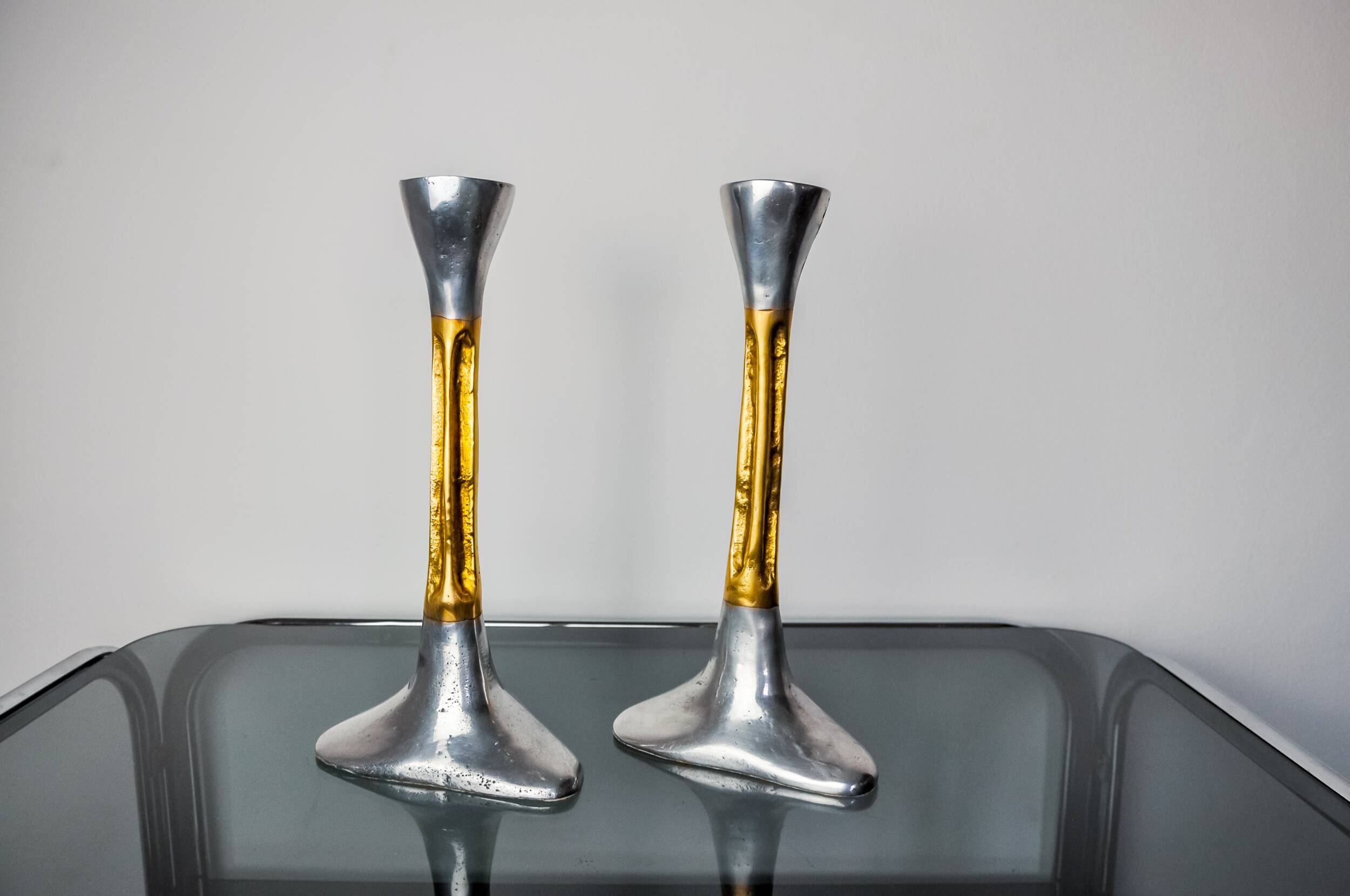 Pair of Brutalist candlesticks by David Marshall, bronze and aluminum, Spain, 1970