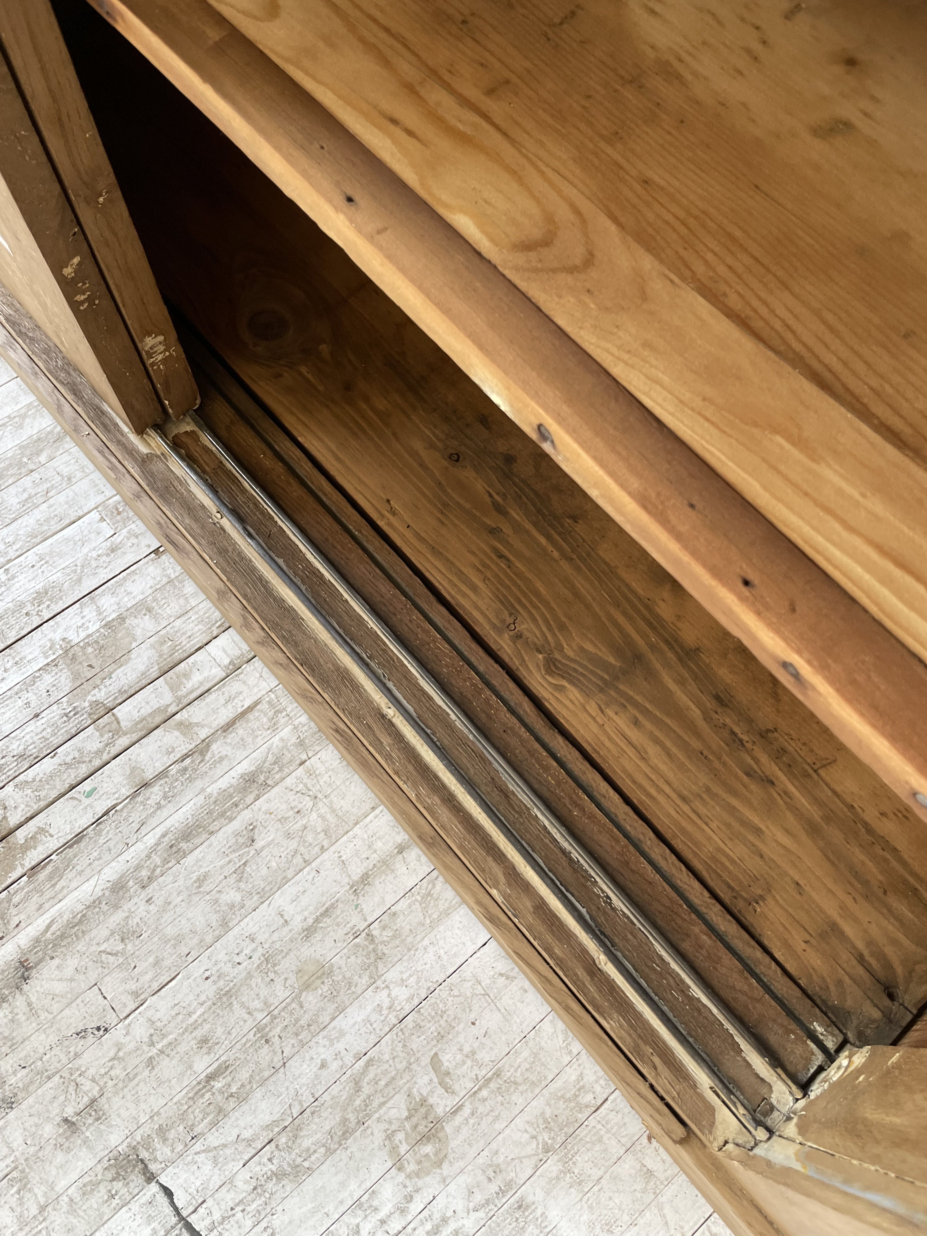 Large row of solid oak loom sliding doors