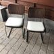 Set of 4 Mid-Century brown faux leather chairs with wood and chrome structure (1970s)