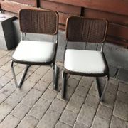 Set of 4 Mid-Century brown faux leather chairs with wood and chrome structure (1970s)