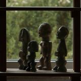 Set of 4 decorative handcrafted African wooden sculptures, mid-century.