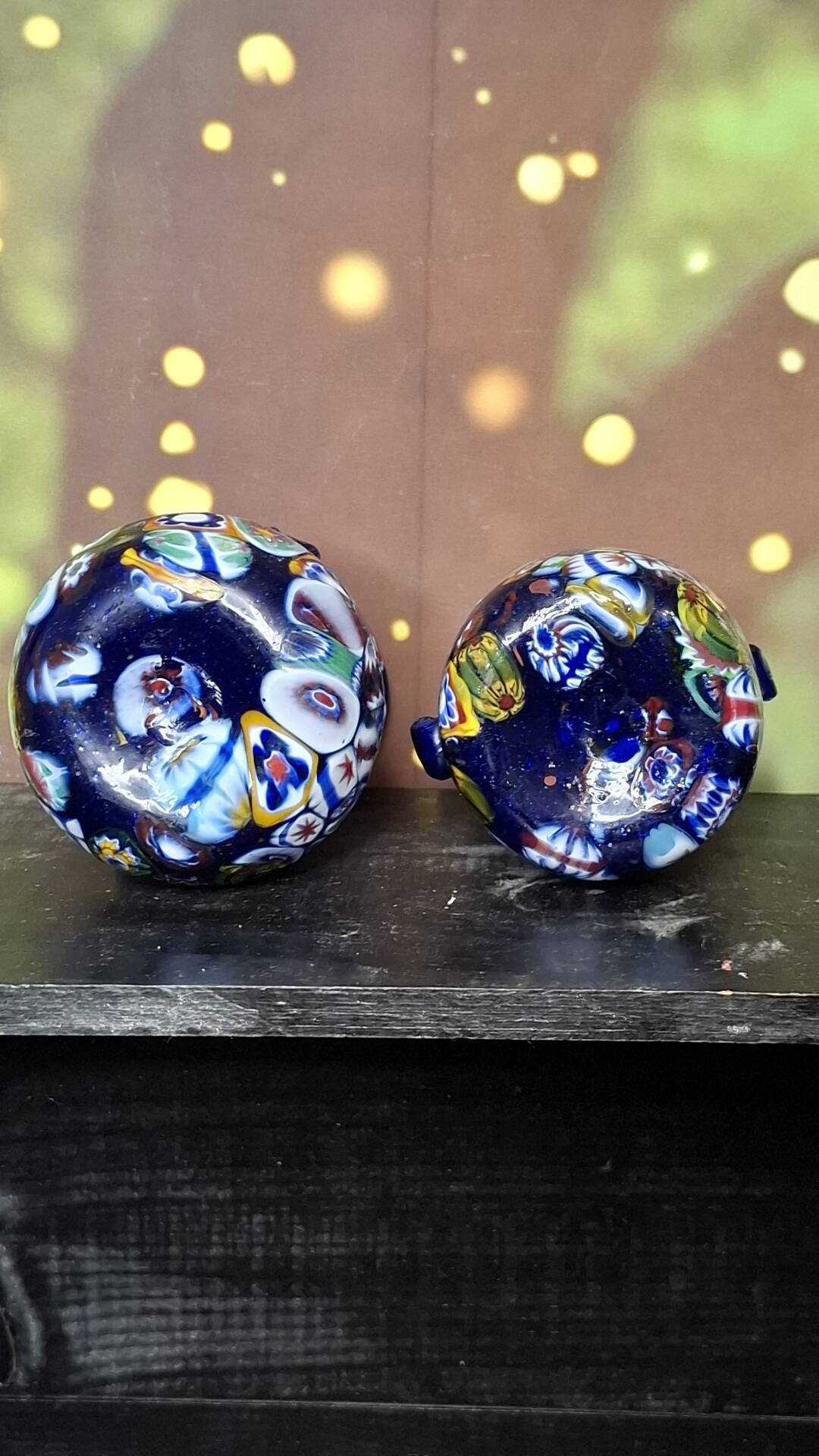 Pair of antique millefiori glass vases attributed to Murano with 2 handles.
