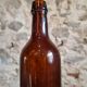 Set of 10 bottles of old Bordeaux French wine in ruby brown glass, 19th century.