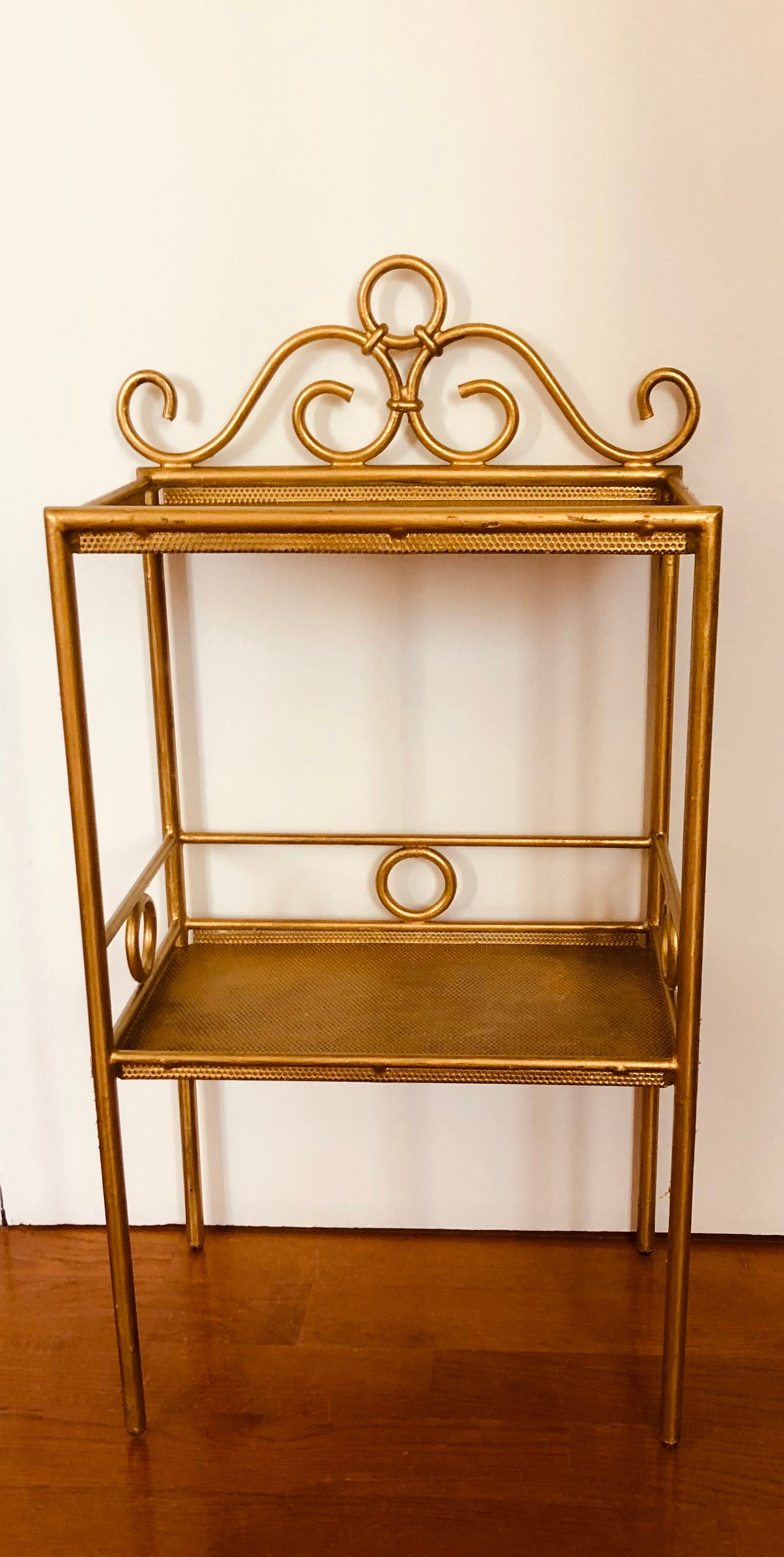 Gold-laquered metal shelf