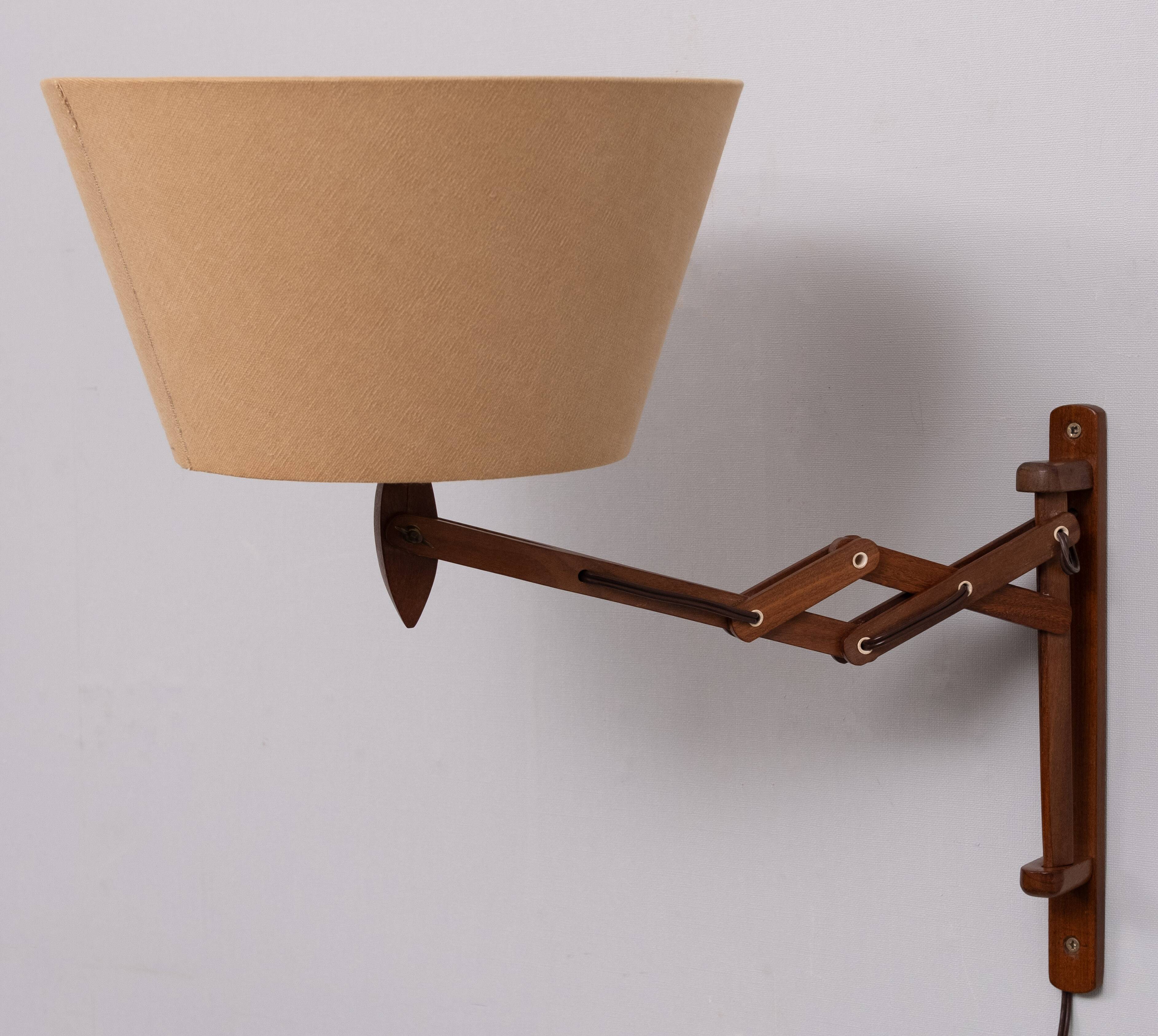 Small teak scissors wall lamp 1960s holland