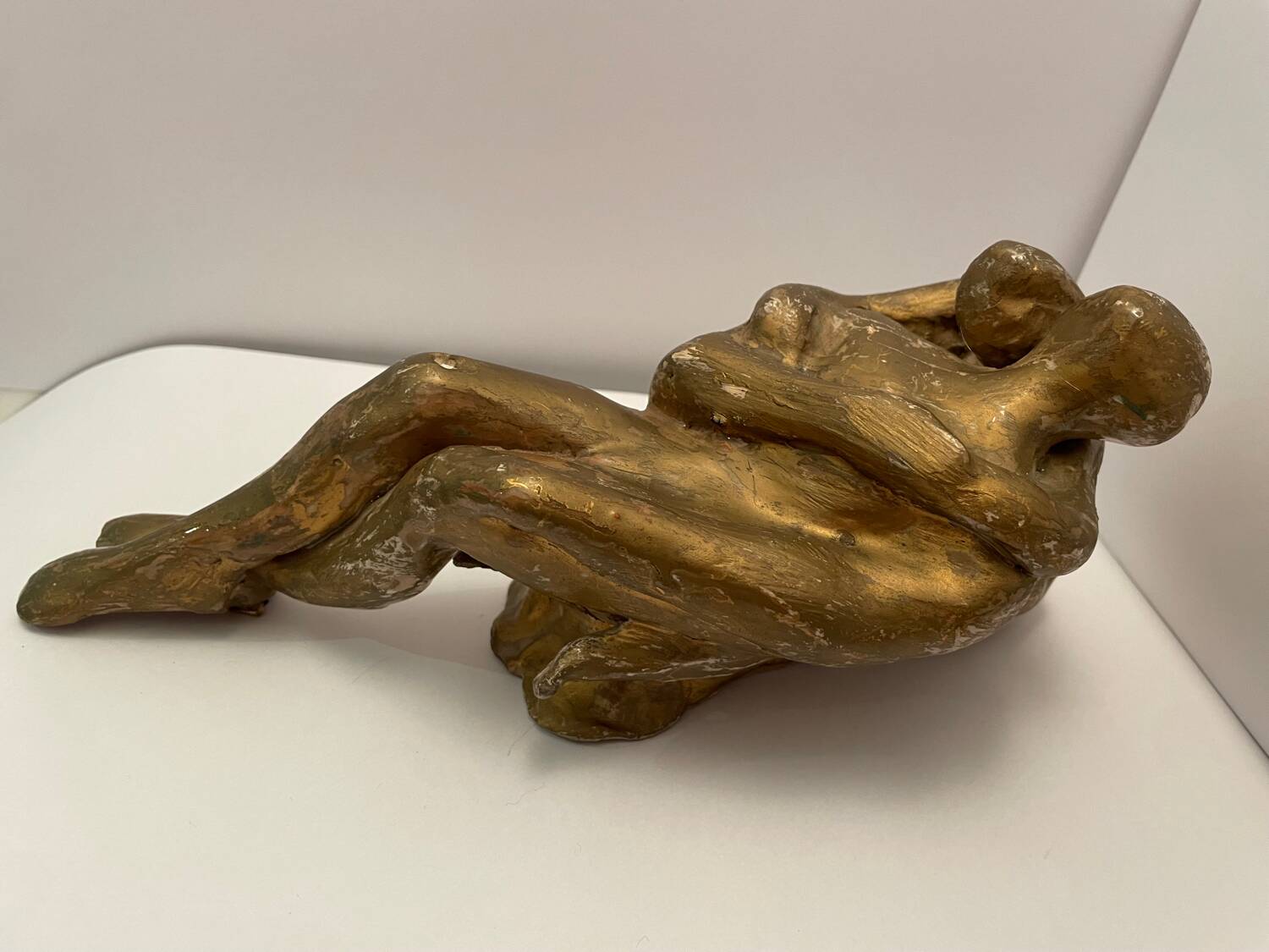 Sculpture of an embracing couple 20th century signed