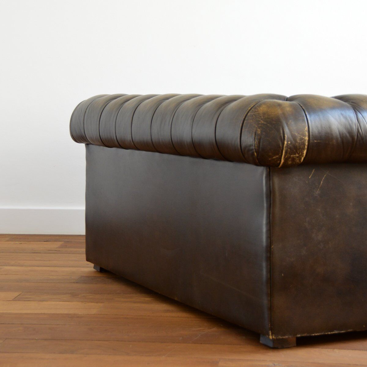 Vintage two-seater leather Chesterfield sofa