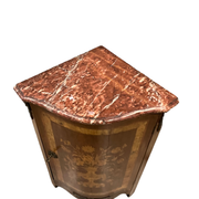 Louis XVI style corner buffet with marquetry decoration featuring a vase of flowers