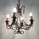 Vintage 4-arm, 4-light chandelier from the 1980s. Brown and gold metal.