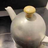 Nomar porcelain and steel teapot