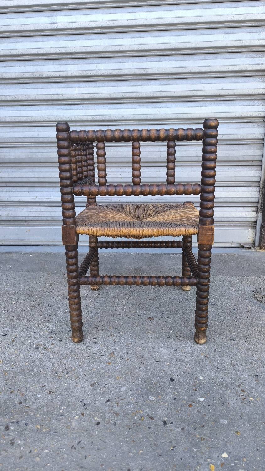 Fauteuil coin du feu en bois tourné début xx ème