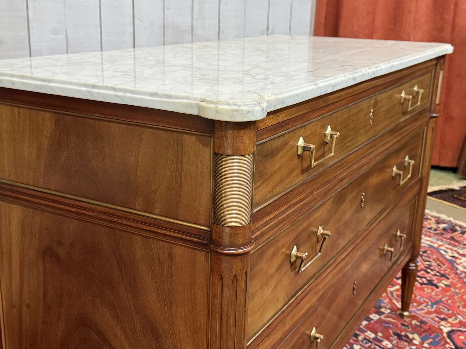 Louis XVI commode in mahogany with a marble top from the 1950s.