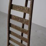 Set of three sculptural iron chairs