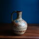 Hand-painted terracotta jug