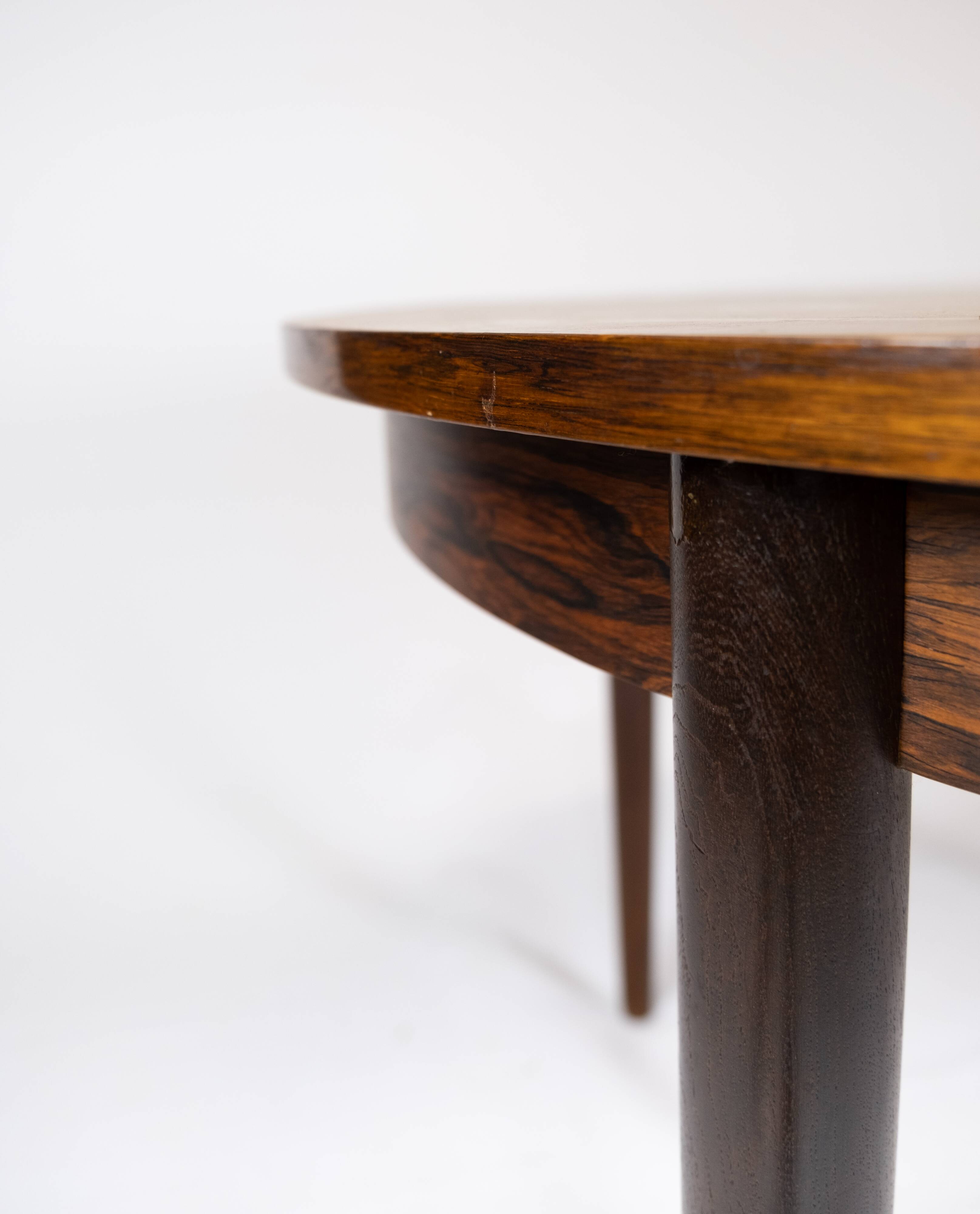 Dining table in rosewood of danish design from the 1960s