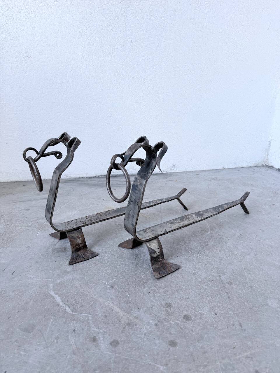 Pair of zoomorphic metal andirons "dogs" 1950