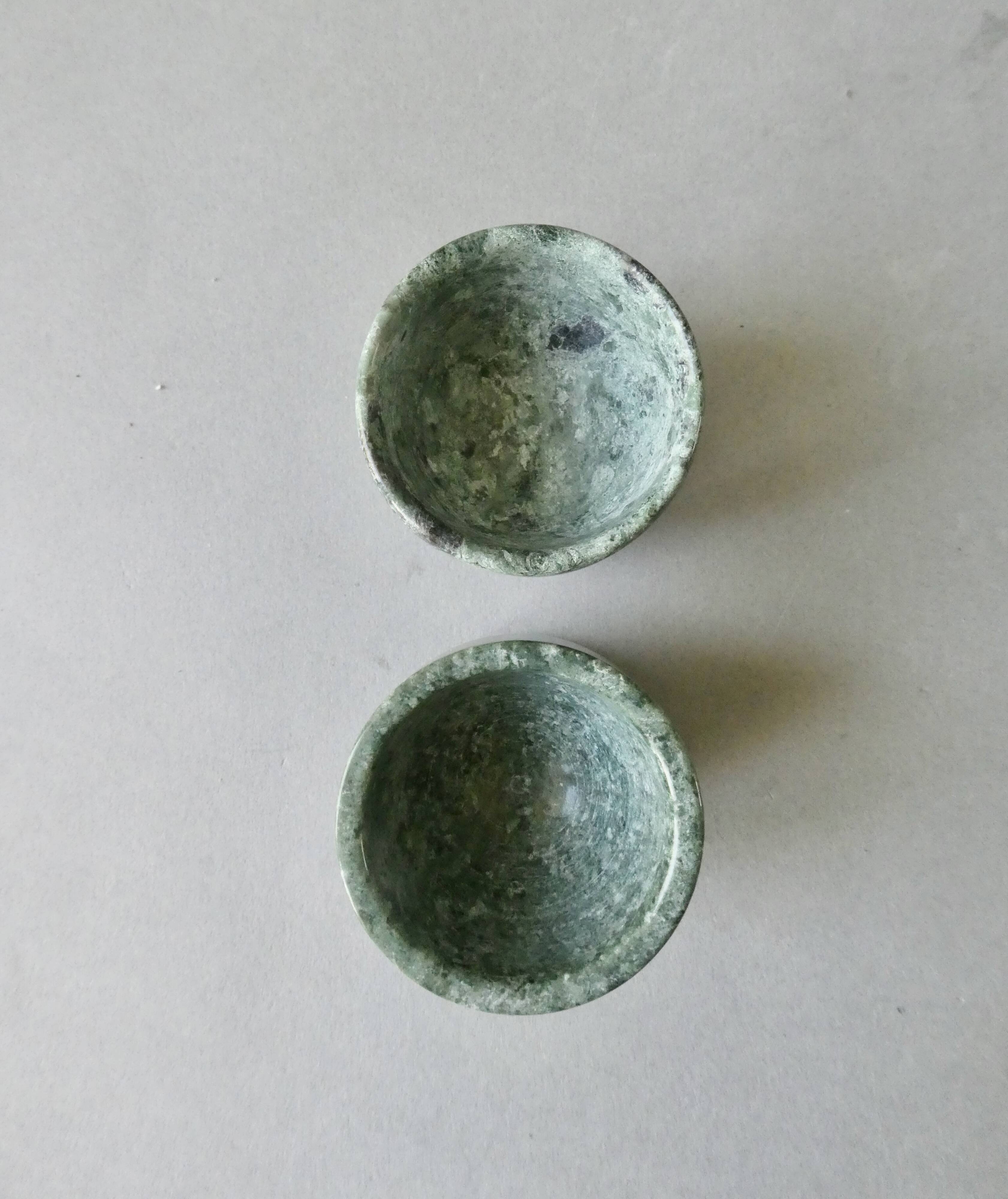 2 marble egg cups in veined white and green, circa 1980.