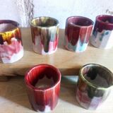 Six old yoghurt pots in enamelled porcelain