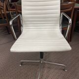 Suite of 4 armchairs in white Ray and Charles Eames leather