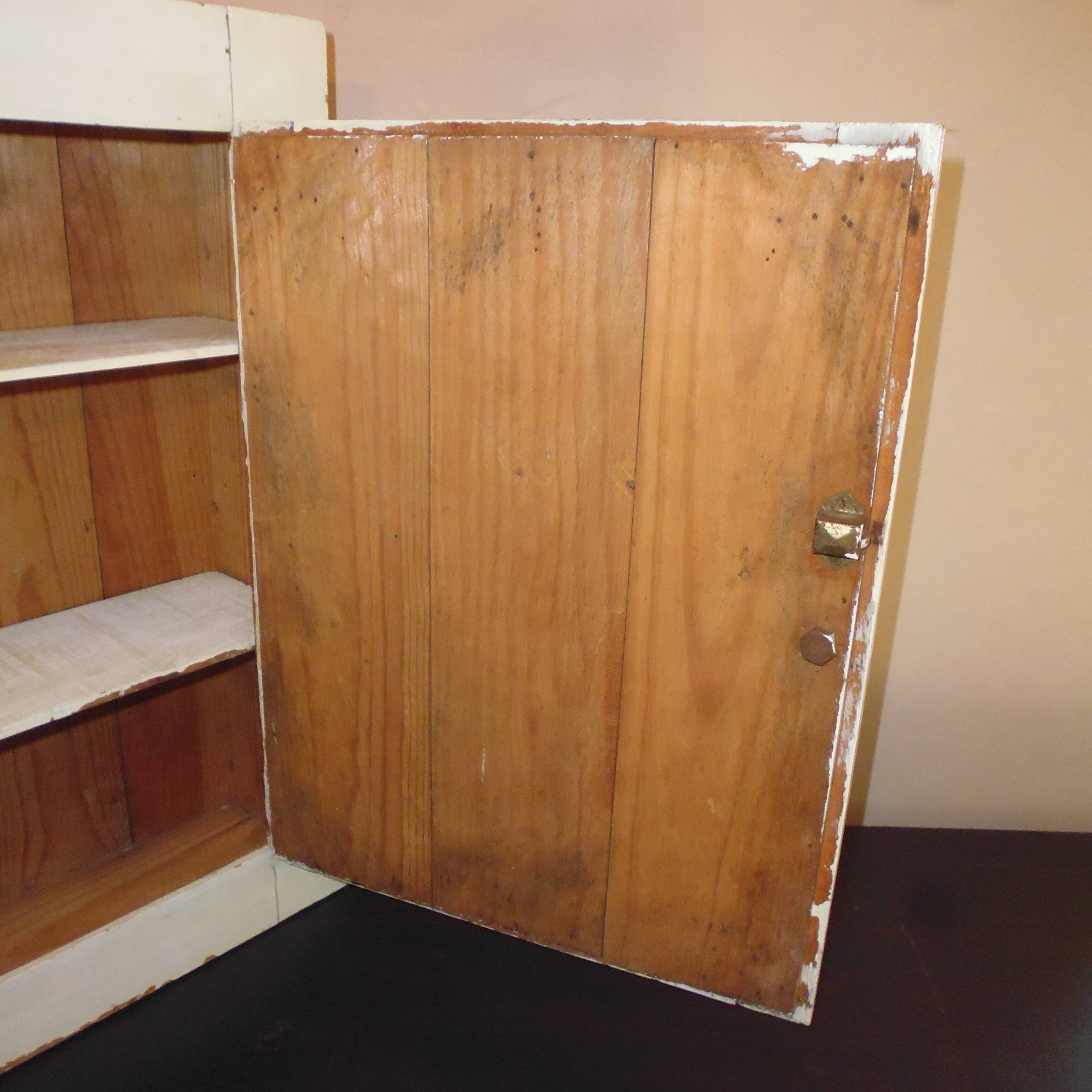 Former wooden medicine cabinet and mirror