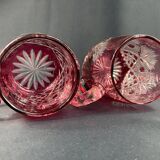 Pair of cut and red tinted crystal beer mugs signed Etzel