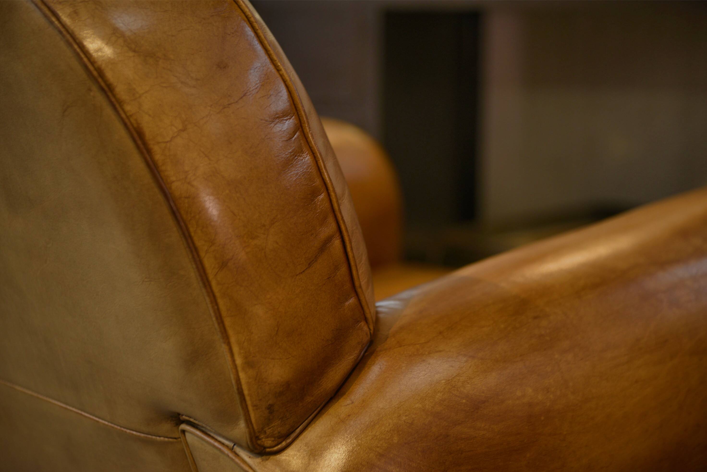 Pair of leather club armchairs