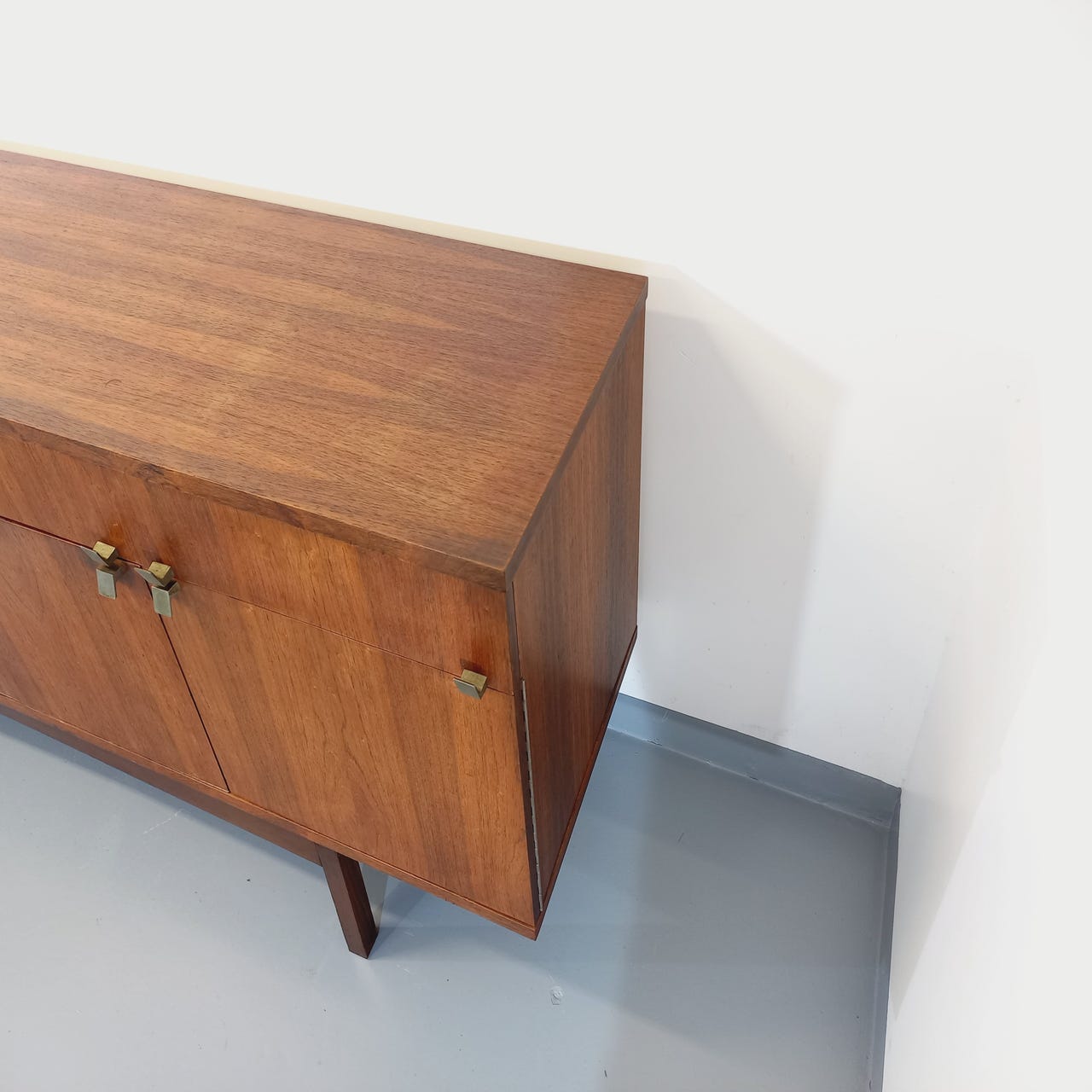 Vintage Scandinavian style row in rosewood and brass from the 60s