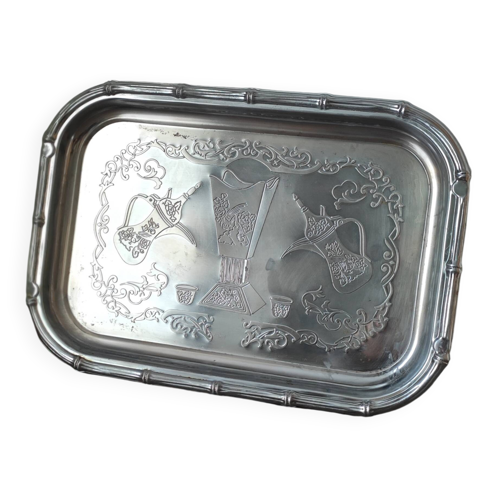 Rectangular silver-plated metal dish with an 80s-style design.
