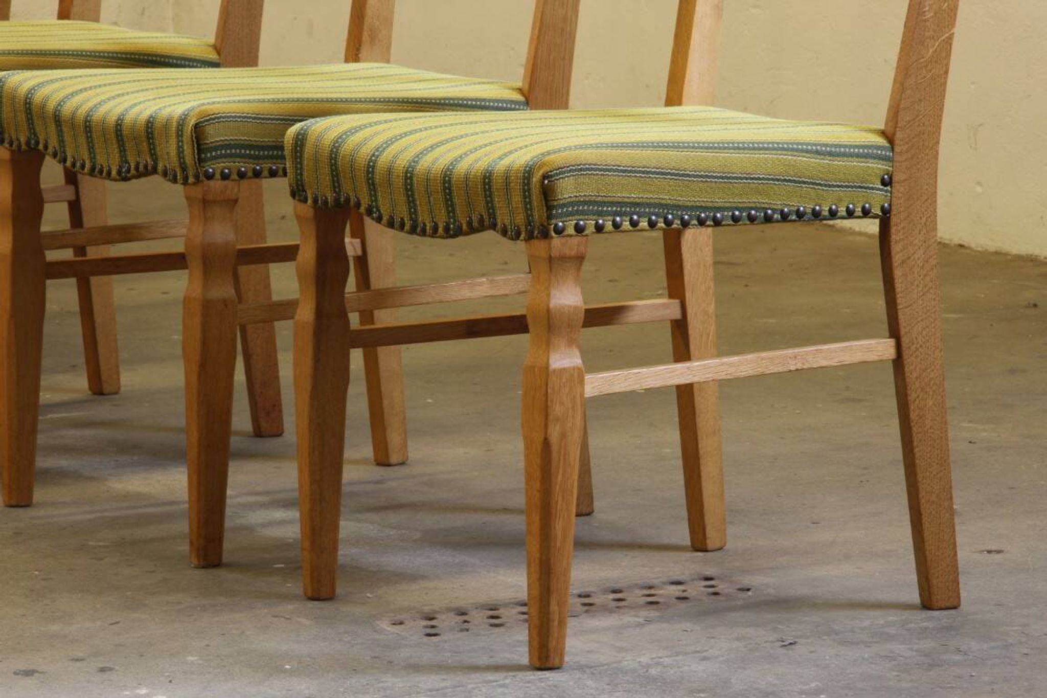 Vintage 1960s brutalist Danish modern oak dining chairs in the style of Henning Kjærnulf