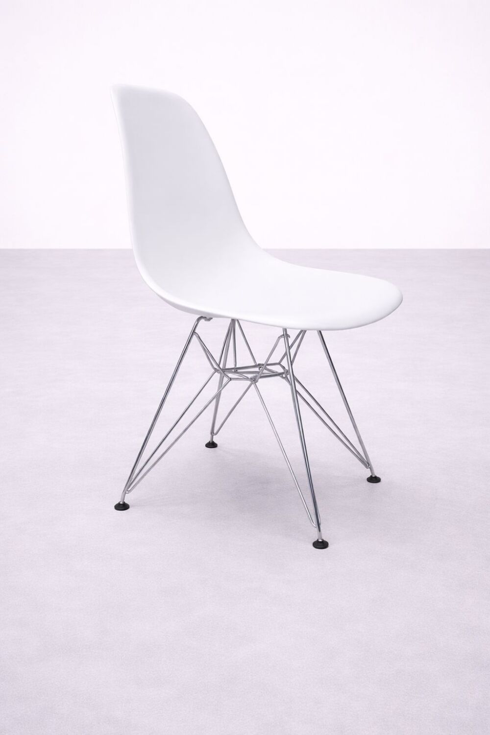 White DSR style Eames chair by Vitra with chrome Eiffel base.