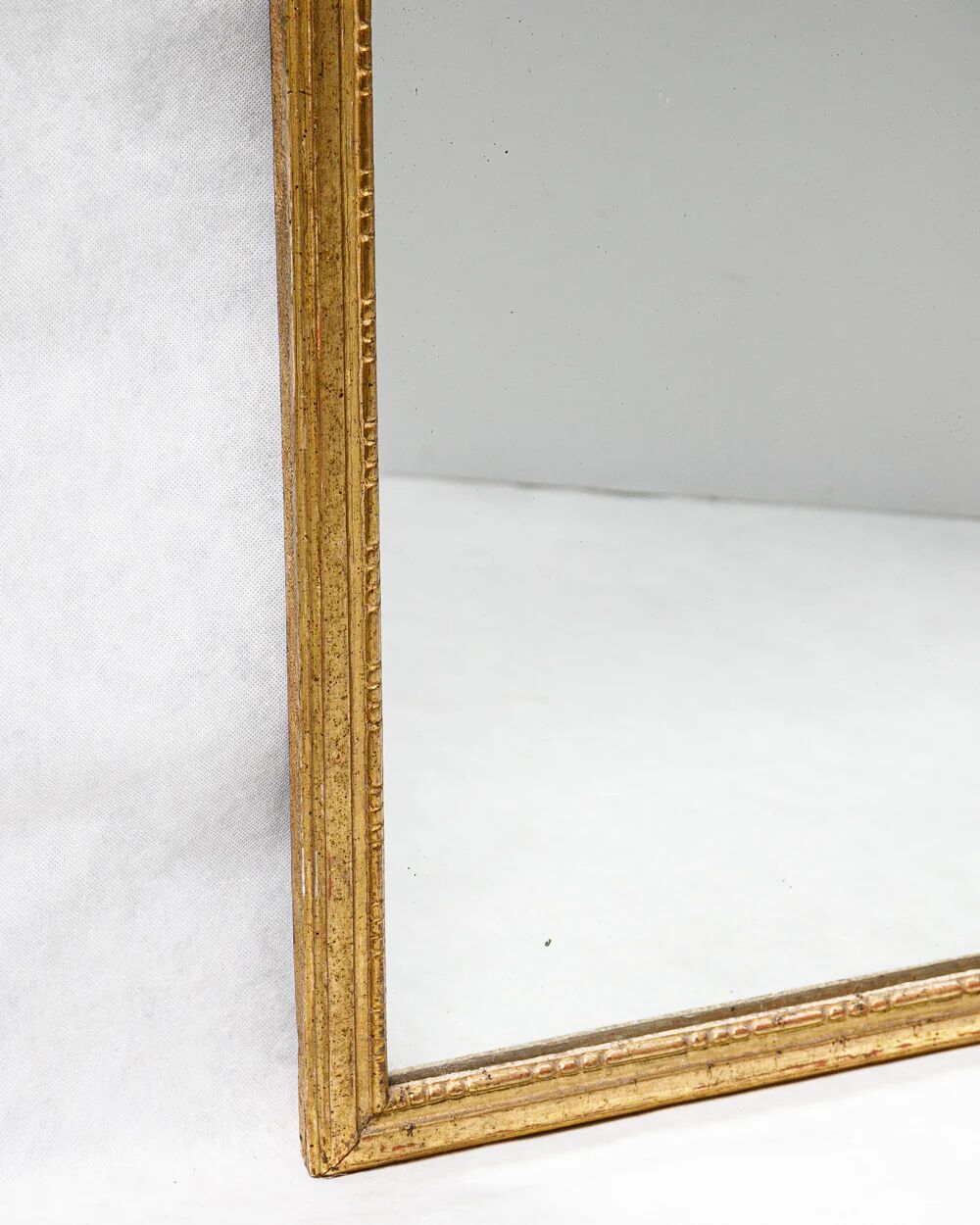Small Louis XVI giltwood "square" mirror