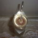 Silver glass and metal ewer