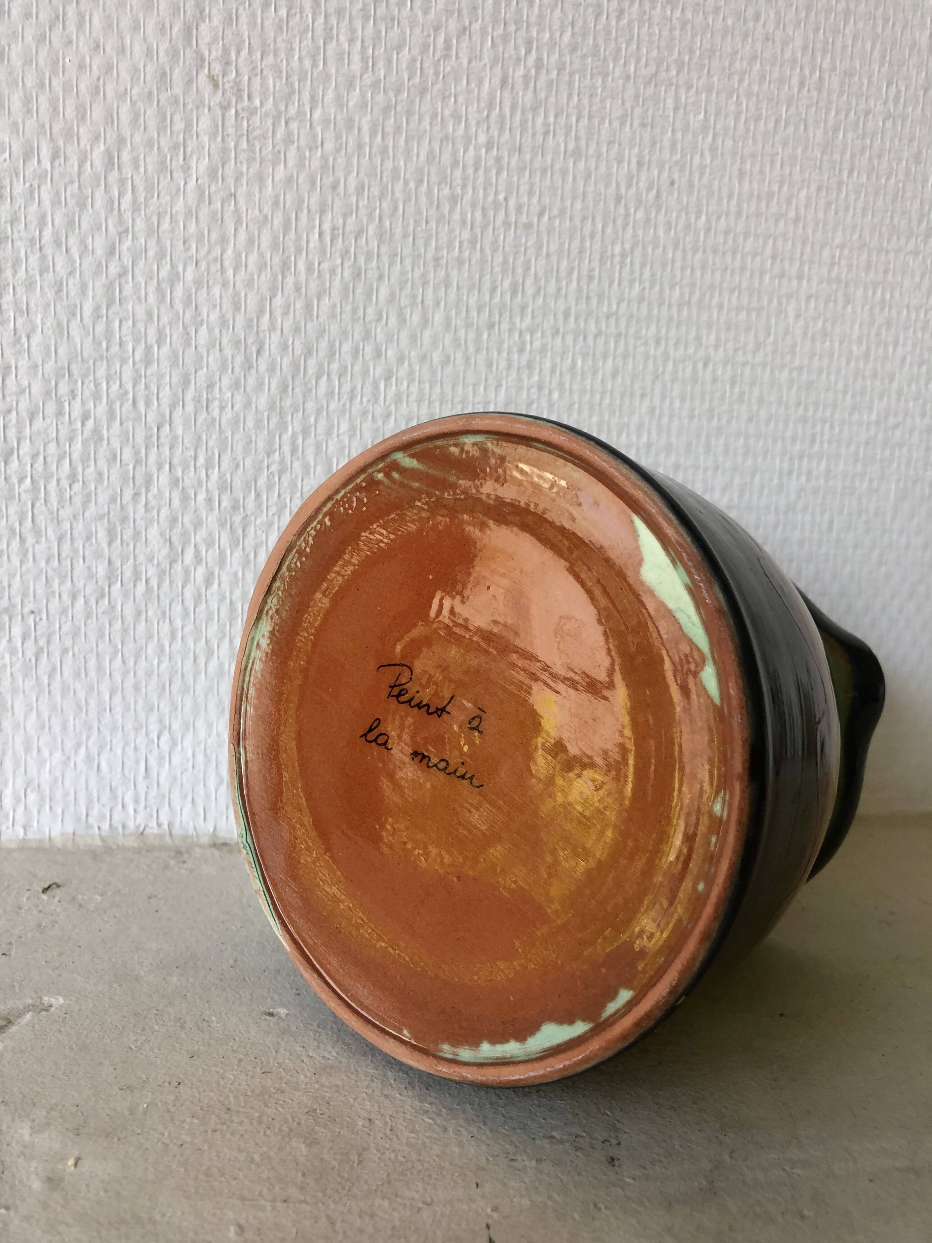 Artisanal terracotta pitcher/pottery