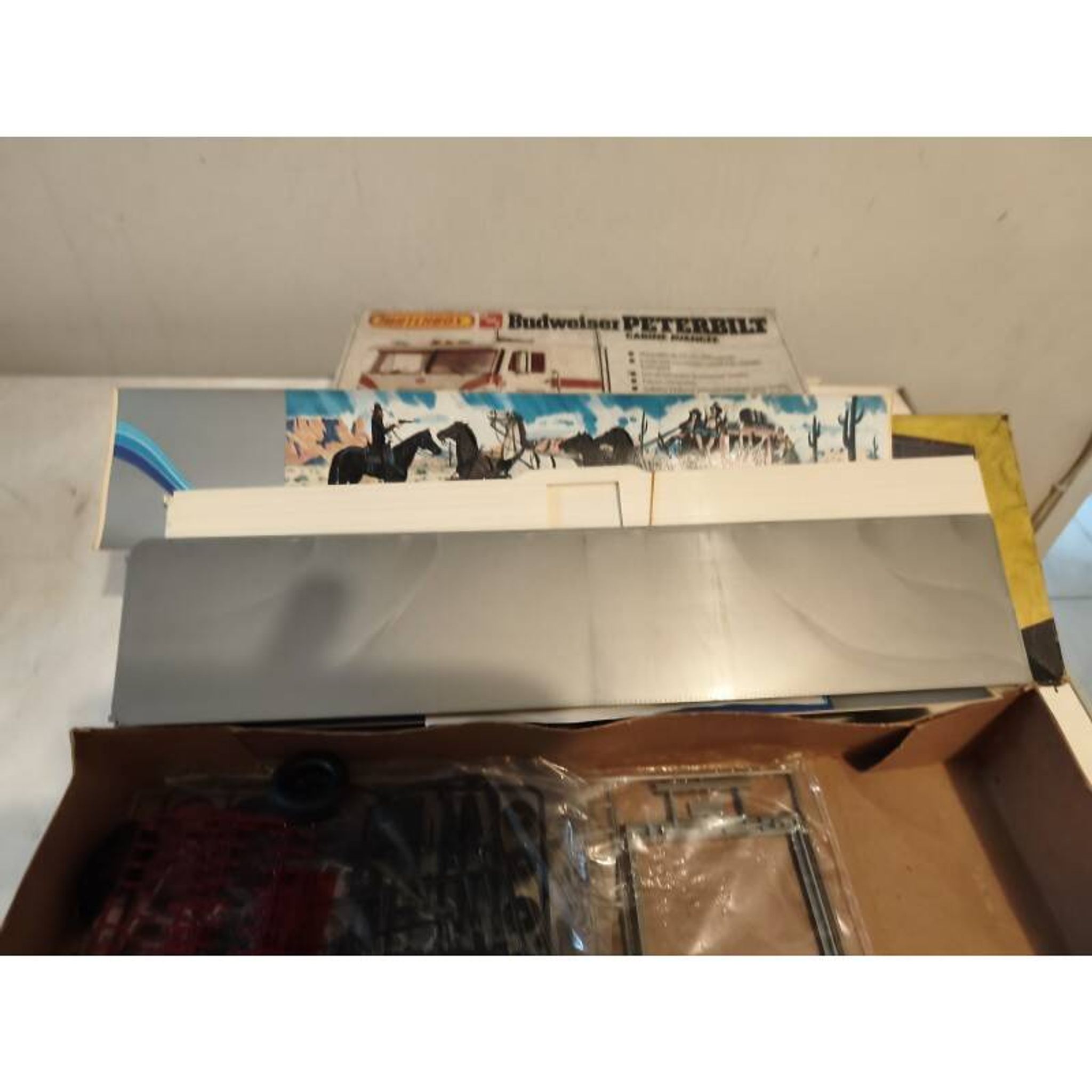 2 boxes of vintage toys