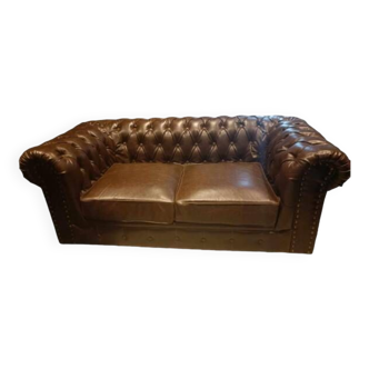 Canapé 2 places avec un fauteuil imitation cuir aspect vieilli