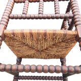 Old corner straw armchair in turned wood