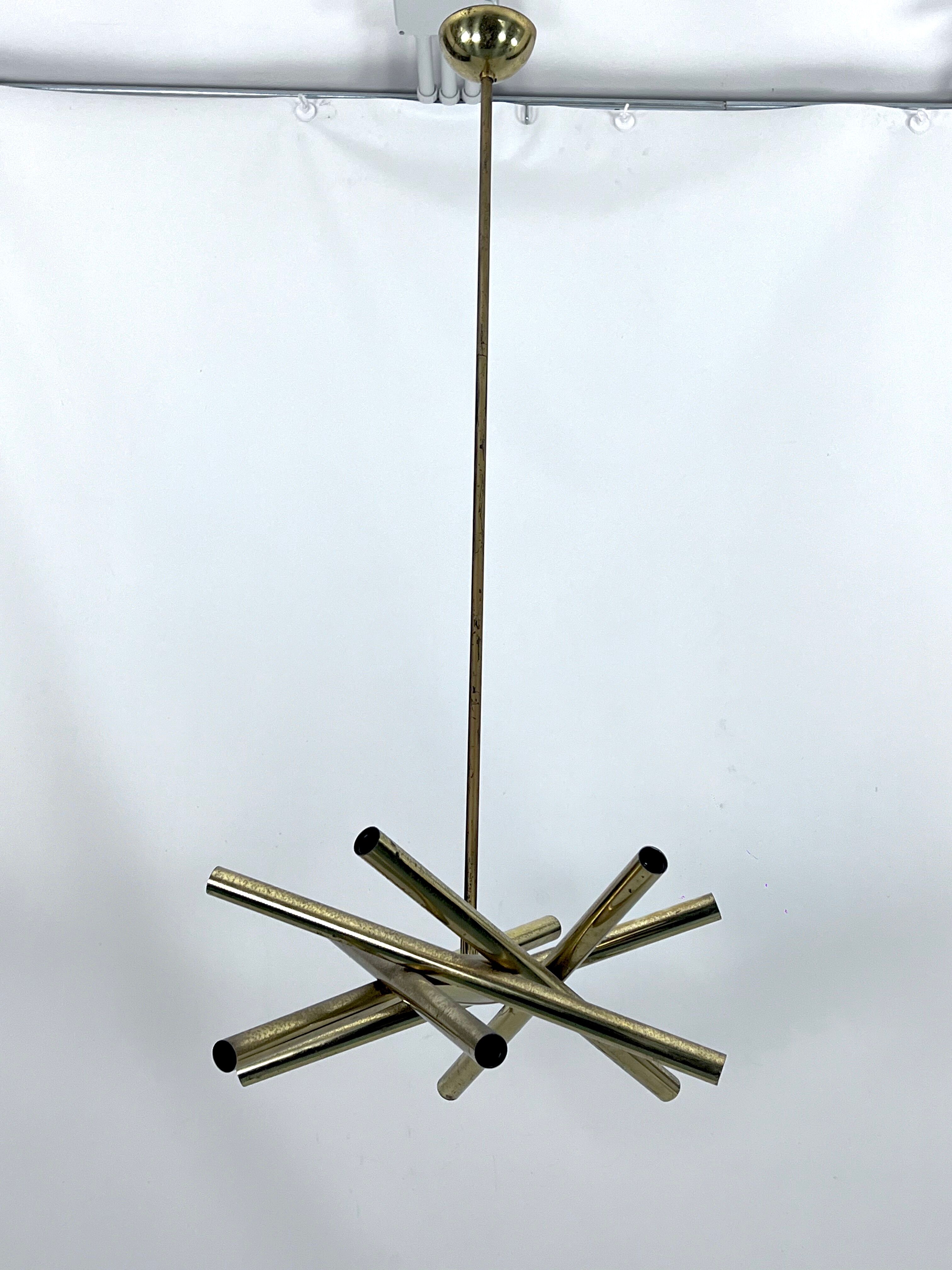 Mid-Century Modern 12 lights Brass chandelier by Stilnovo. Italy 1960s