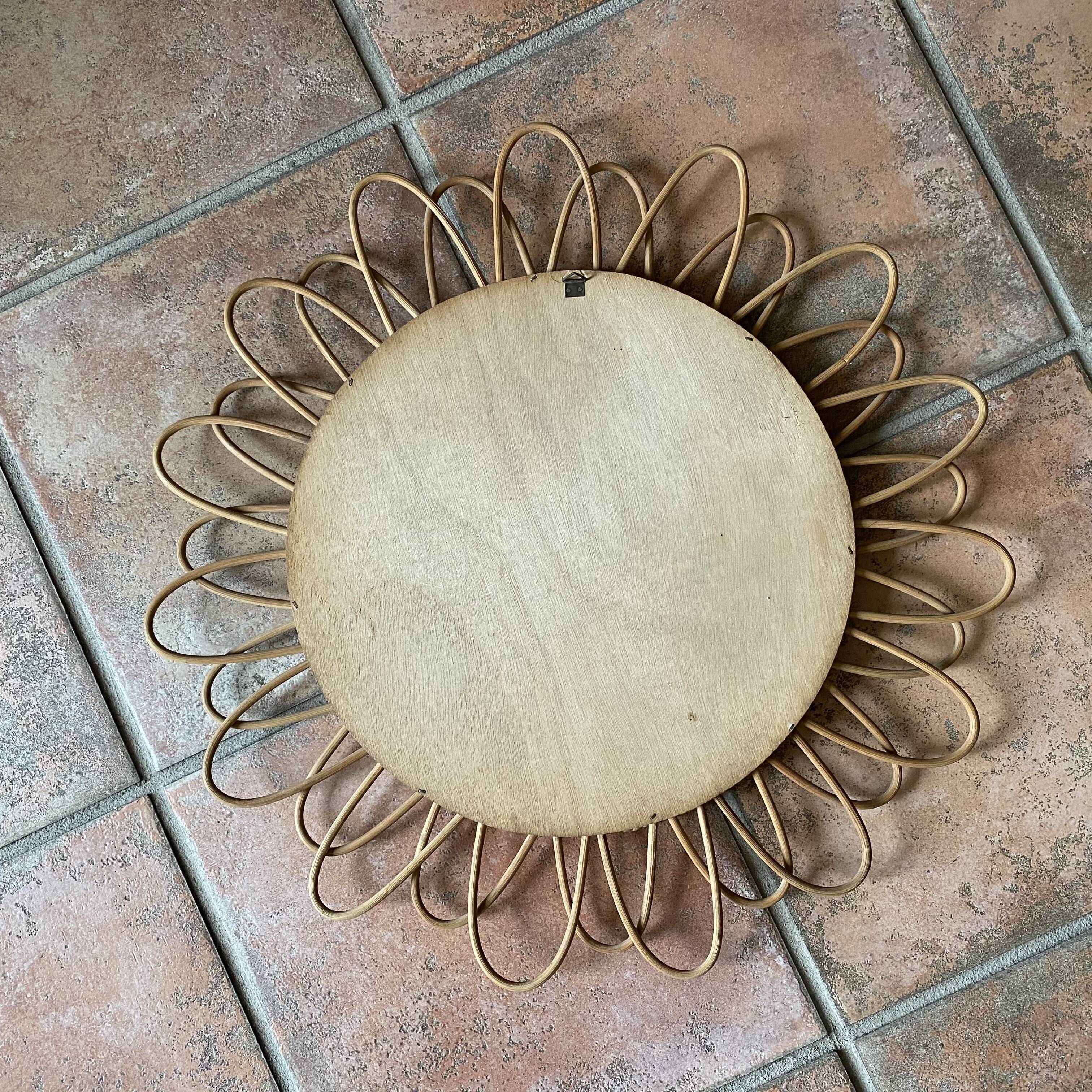 Mirror sun in rattan arched. 52cm. 1960