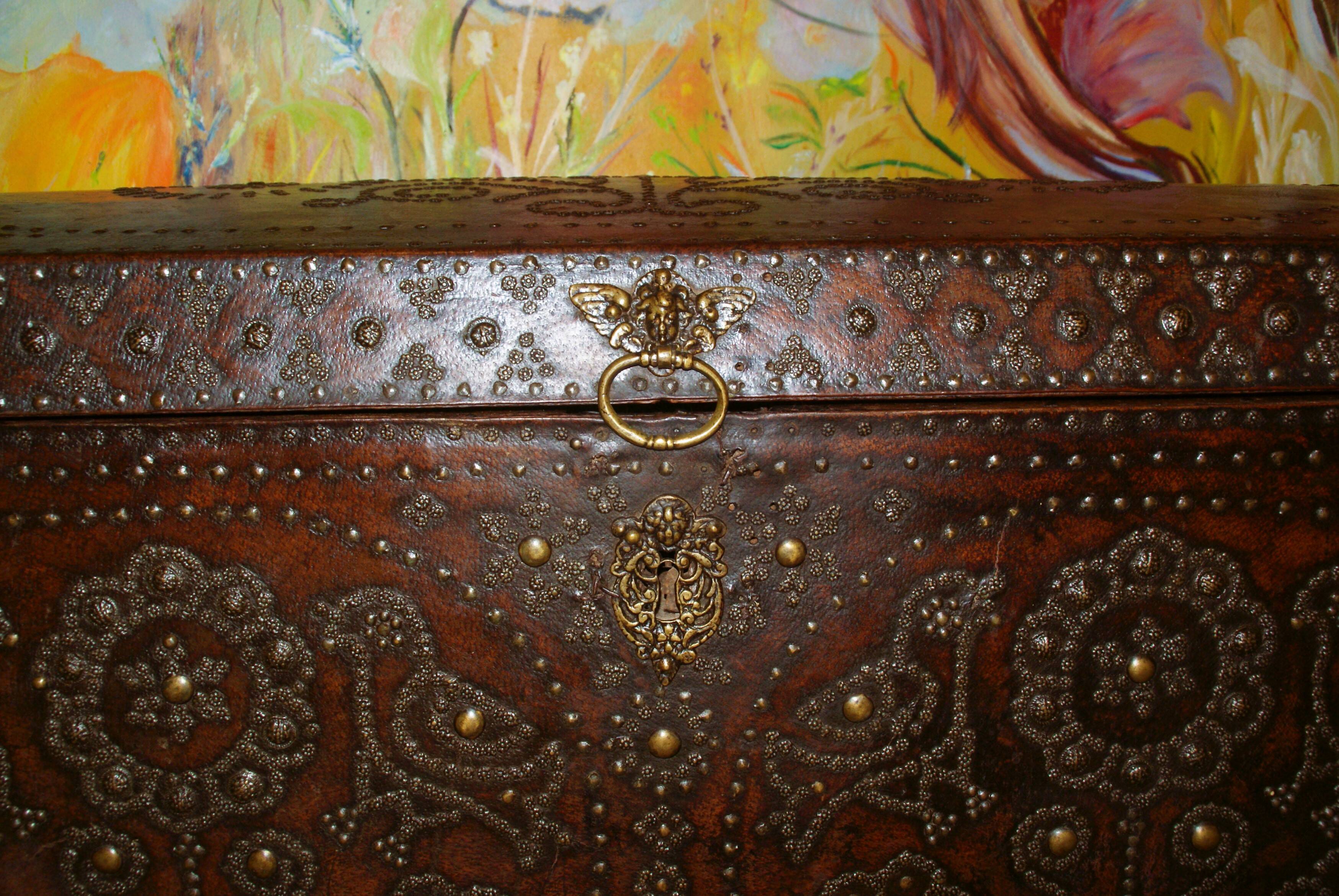 17th century studded leather travel trunk, richly decorated