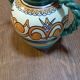 Vase boule Henriot Quimper arabesques vert orange