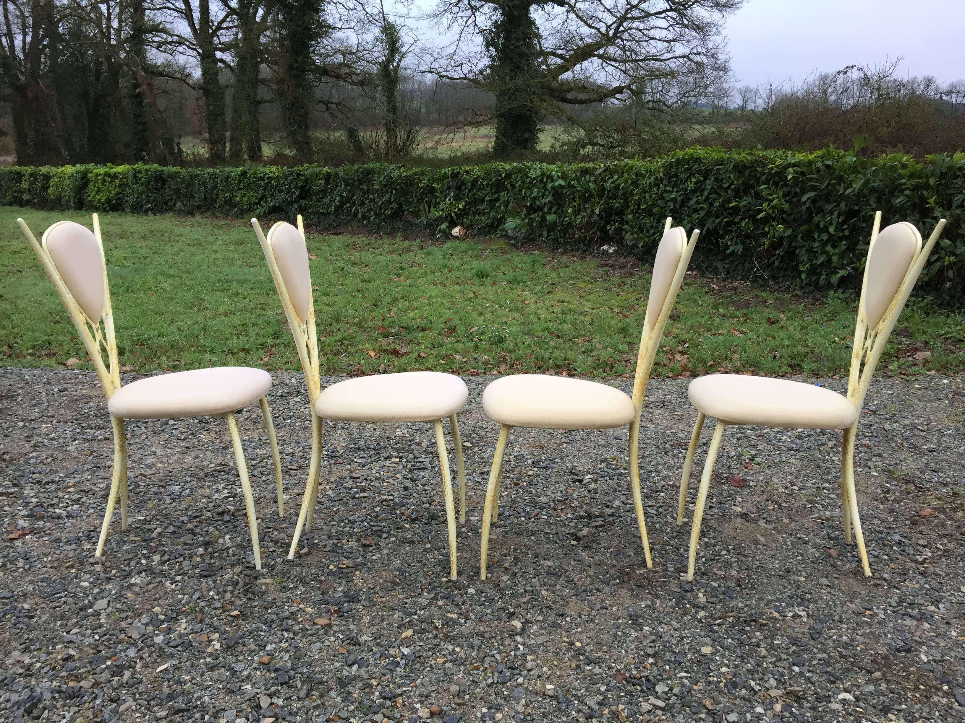 4 vintage chairs in tubular metal lacquered white yellow.