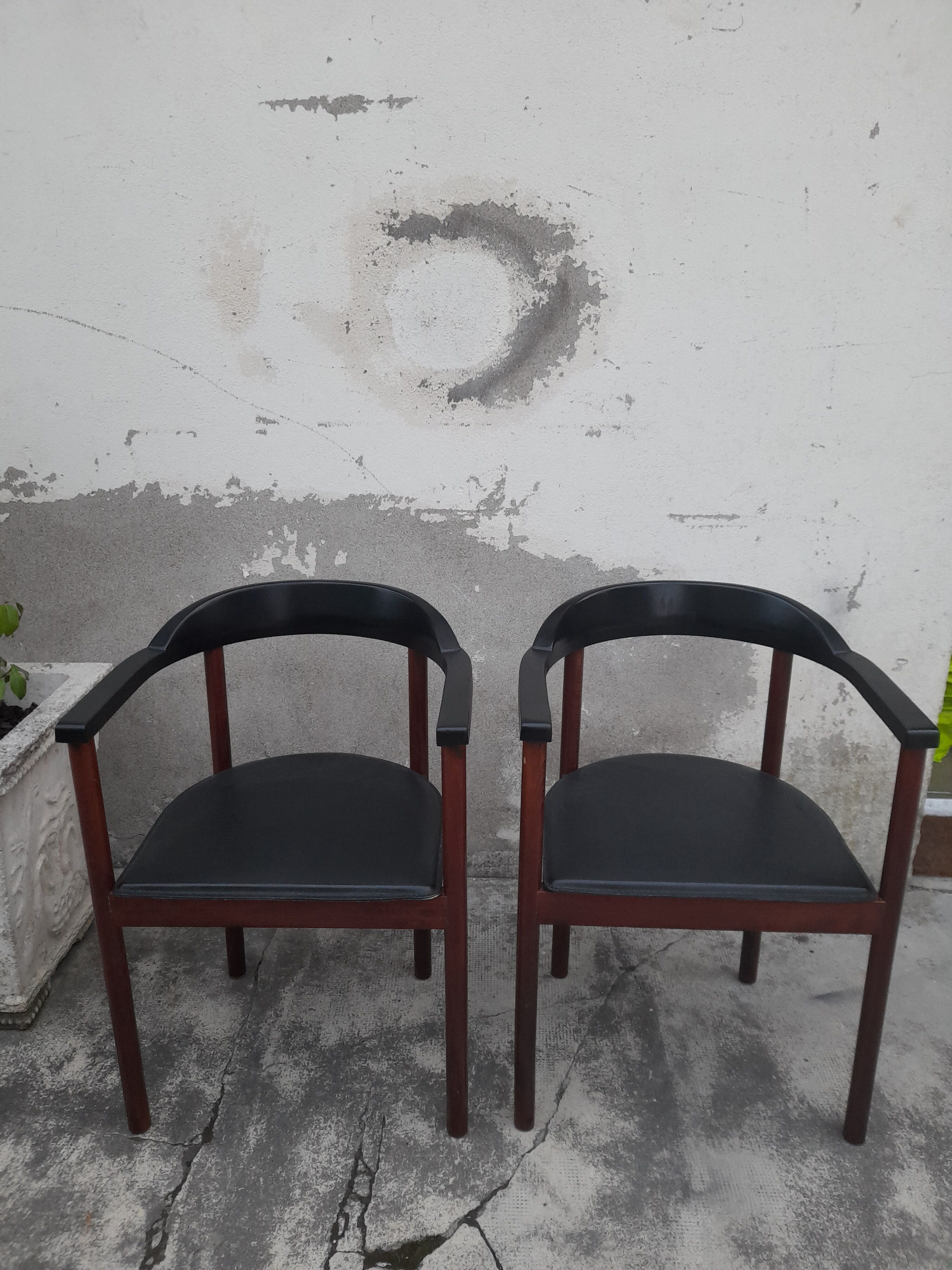 Pair of Scandinavian armchairs in teak and leather