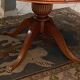 Circular table in light mahogany and leather base claw English style