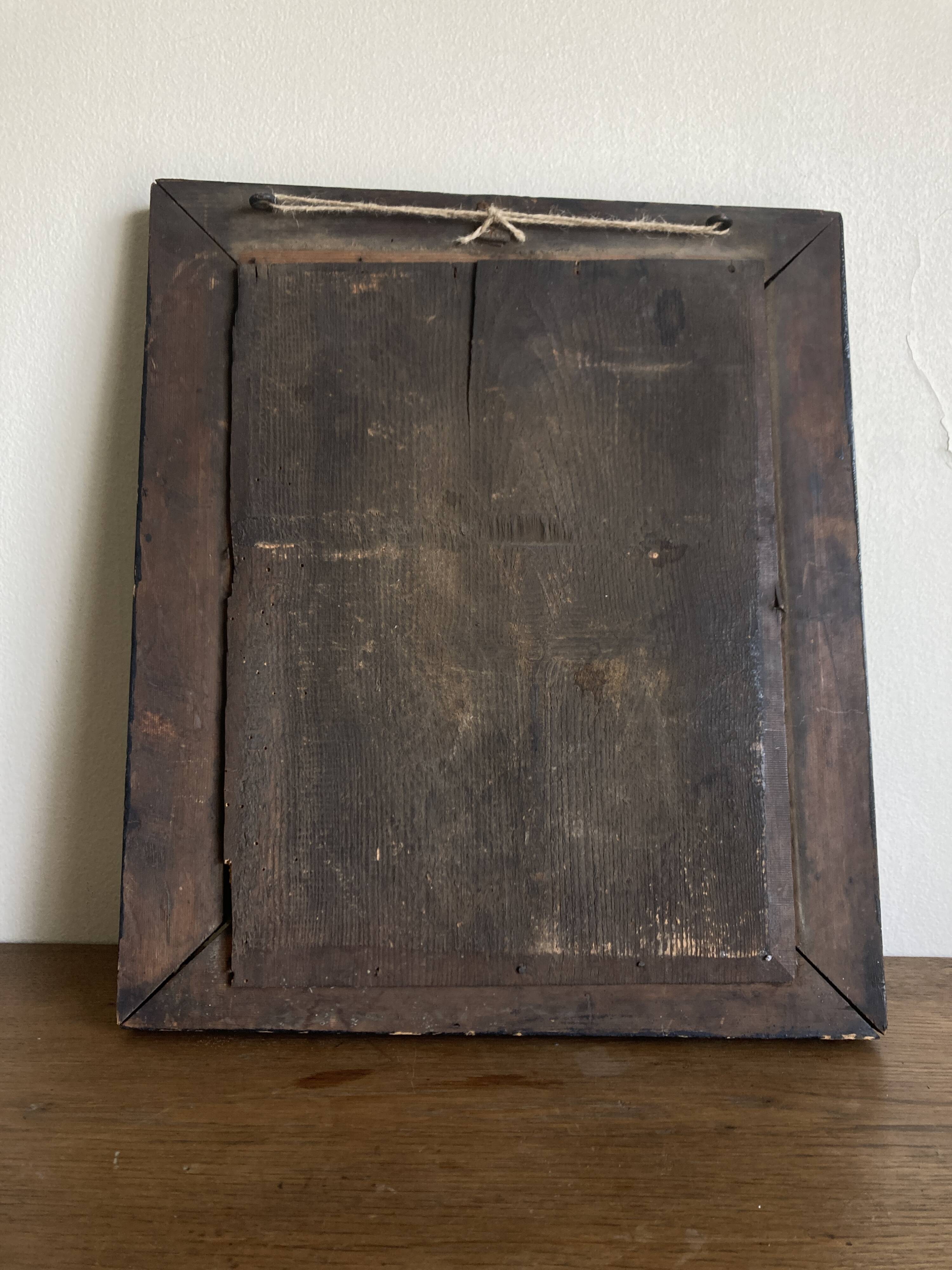 19th century blackened mirror with pitted glass 34cm x 40cm