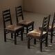 Modernist chairs in oak and woven straw, France, circa 1948