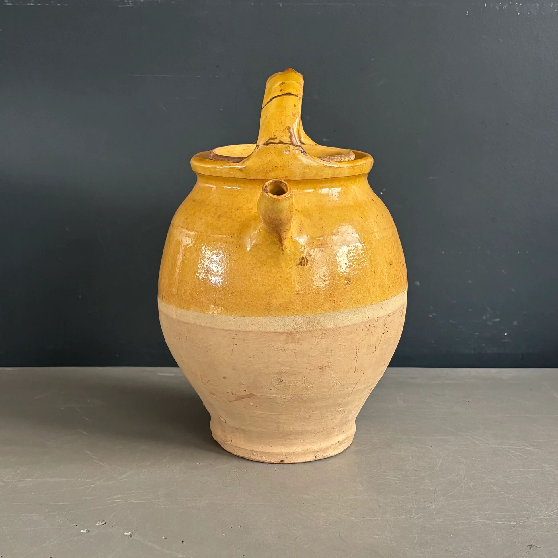 Ancient oil jar in glazed terracotta