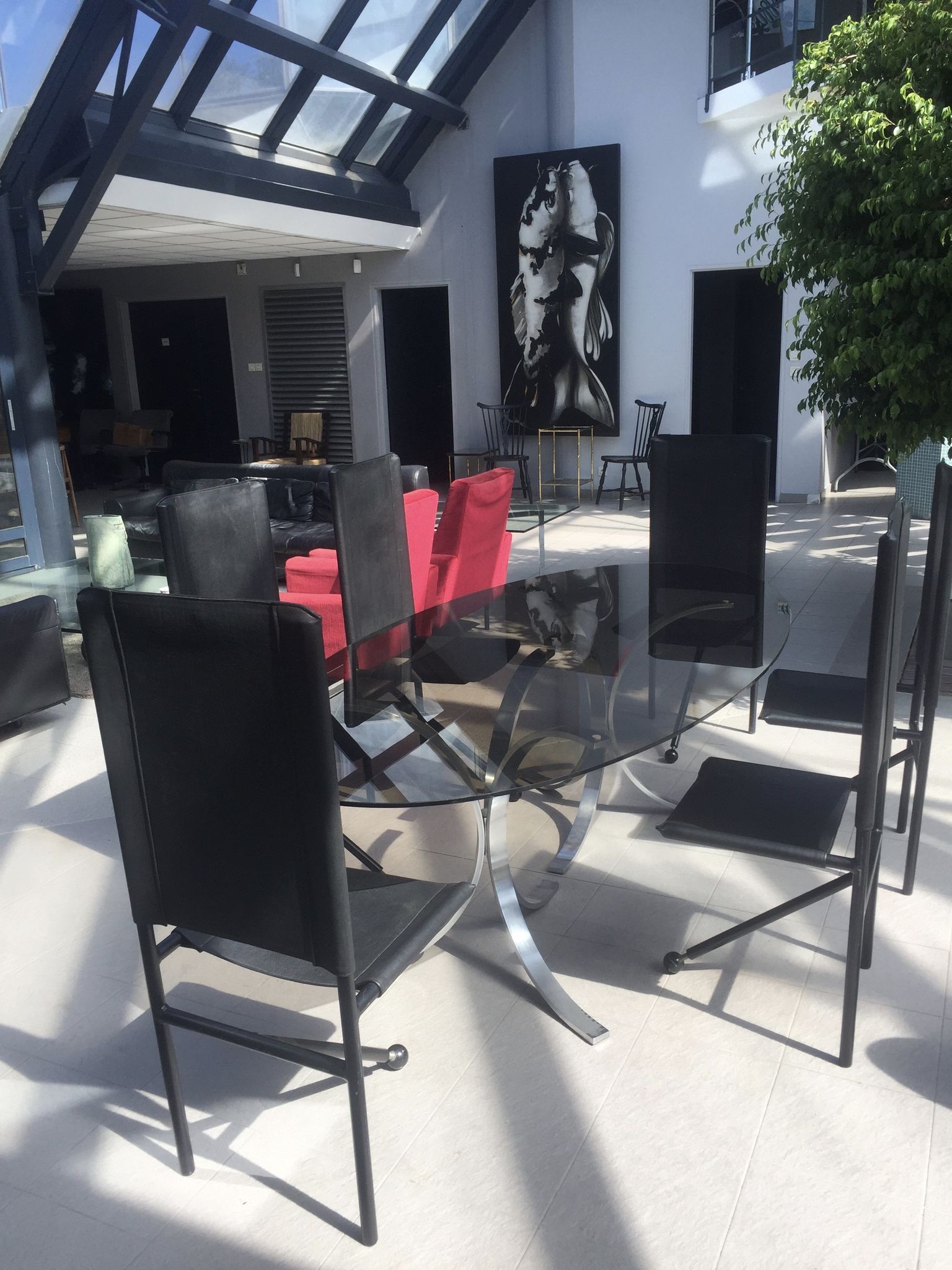 Set of 6 dining room chairs with tripod legs in grained leather and metal 1970