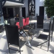 Set of 6 dining room chairs with tripod legs in grained leather and metal 1970