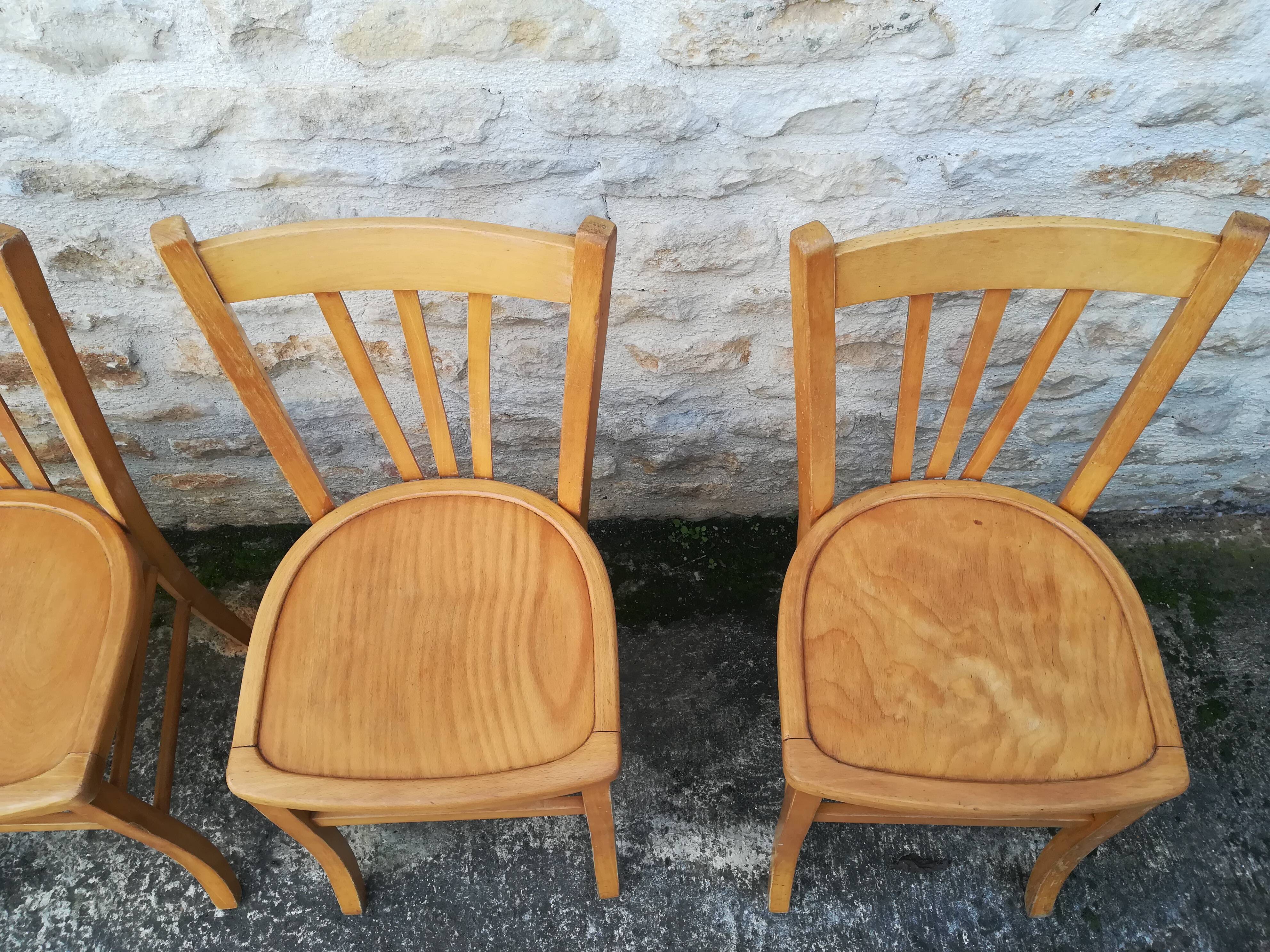 Set of 8 mismatched bistro chairs